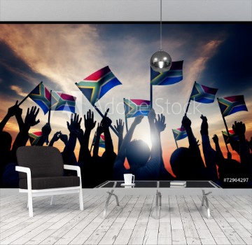 Picture of People Waving South African Flags in Back Lit